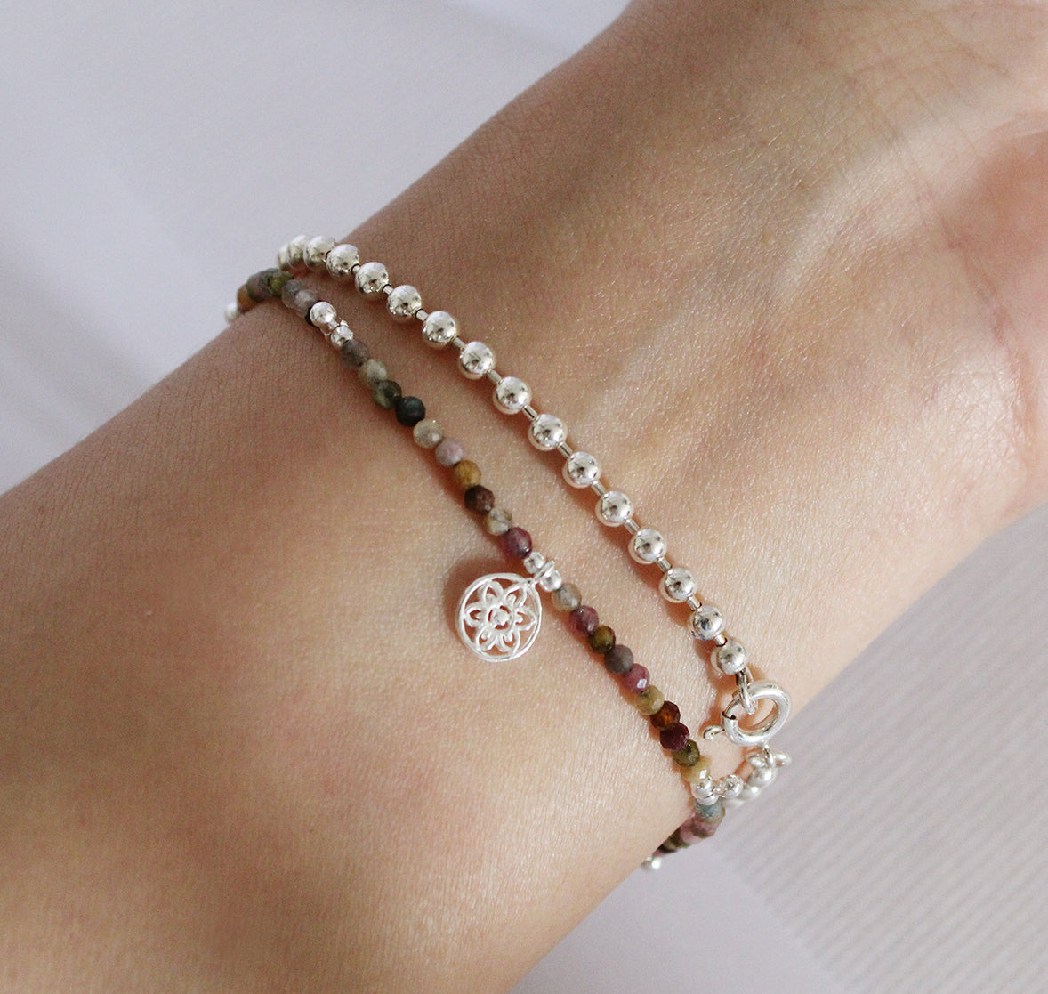Brown Beaded Bracelet with Drop Beads and Atomic Charm